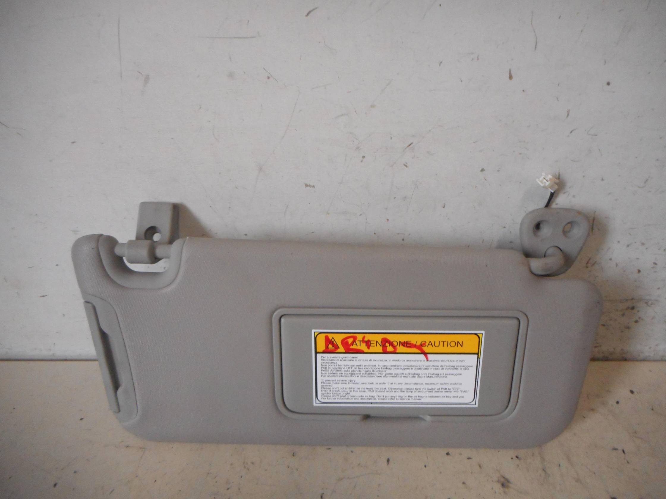 Aletta parasole parabrezza dx.